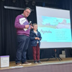 Trustee David Lloyd and Ethan, age 6 at the fundraising meeting.